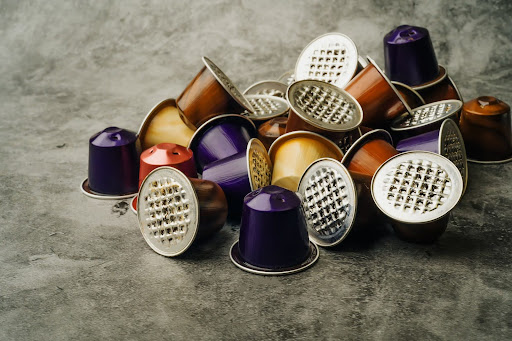coffee capsules, used coffee pods on table ,selective focus